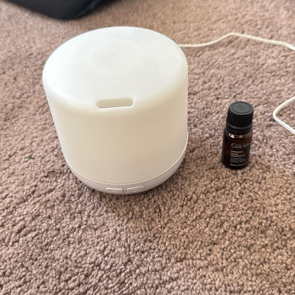 Plug in diffuser with immune blend essential oil.